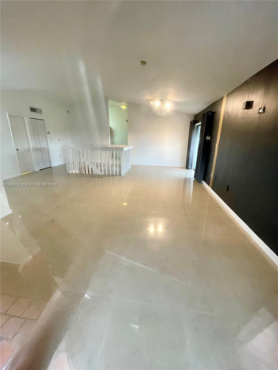 9001 Southwest 94th Street, Unit 201 Miami, FL 33176 - Photo 4 of 10 a view of an empty room