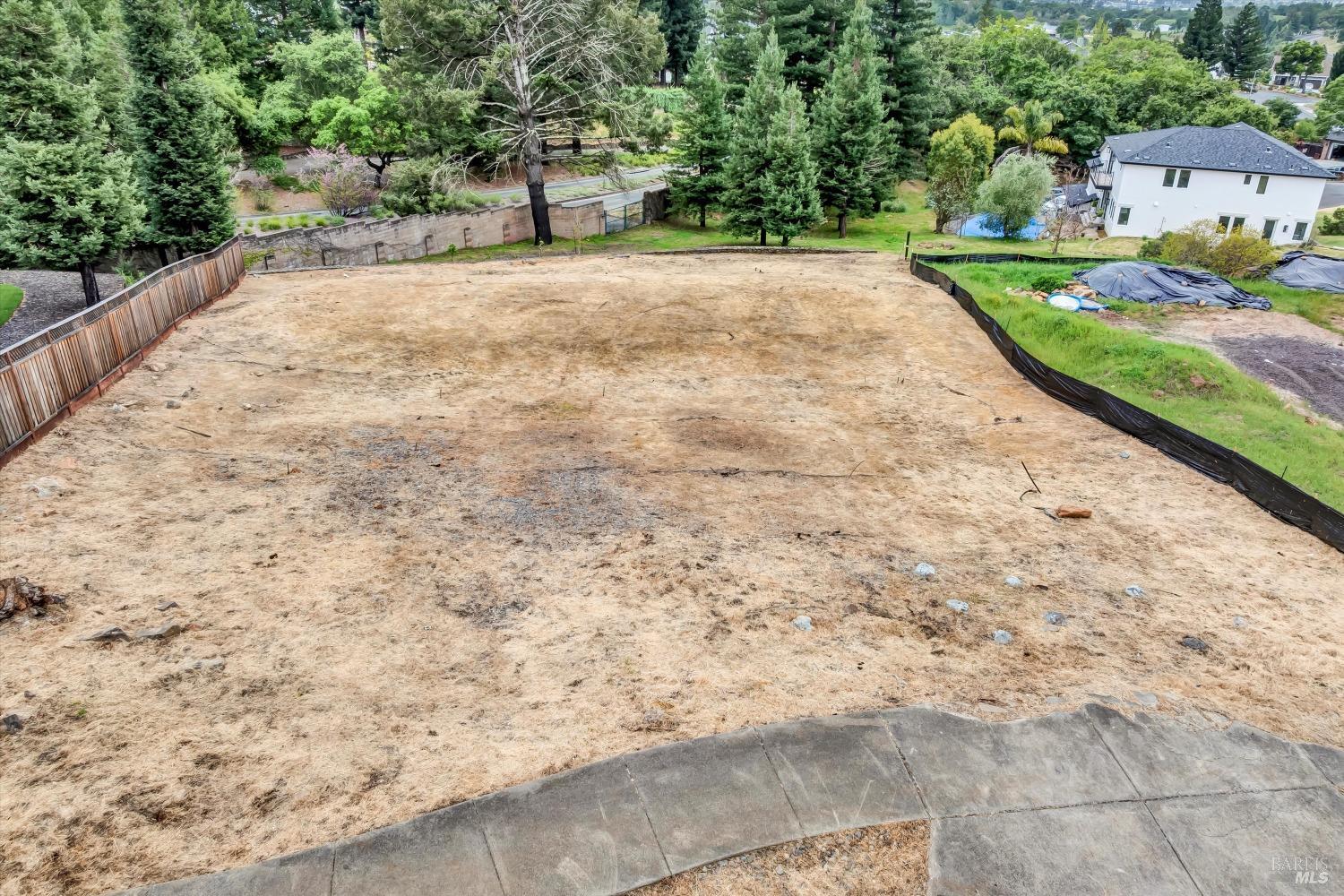 1990 West Bristlecone Court Santa Rosa, CA 95403 - Photo 8 of 13 a view of backyard with large trees and plants