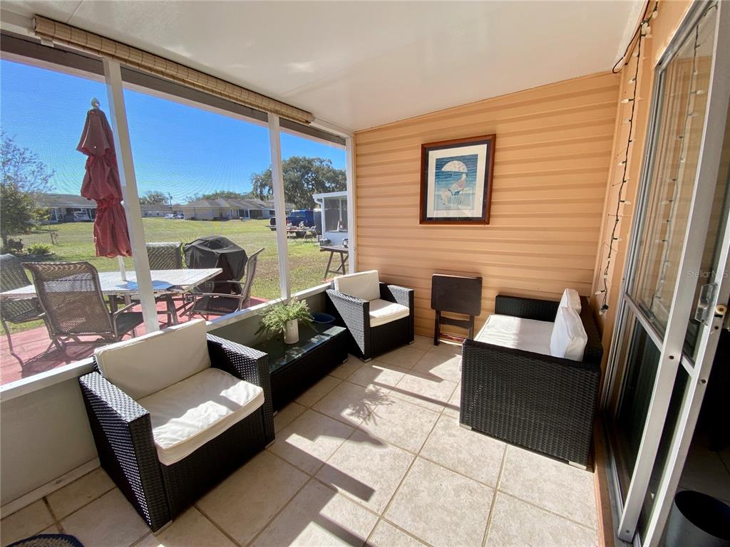 3429 Club Circle Lakeshore, FL 33854 - Photo 12 of 37 a living room with furniture and a large window