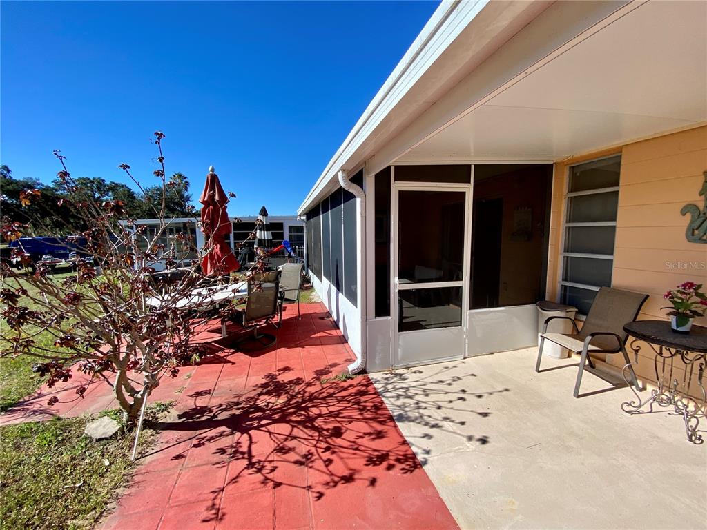 3429 Club Circle Lakeshore, FL 33854 - Photo 18 of 37 a view of a terrace with chairs