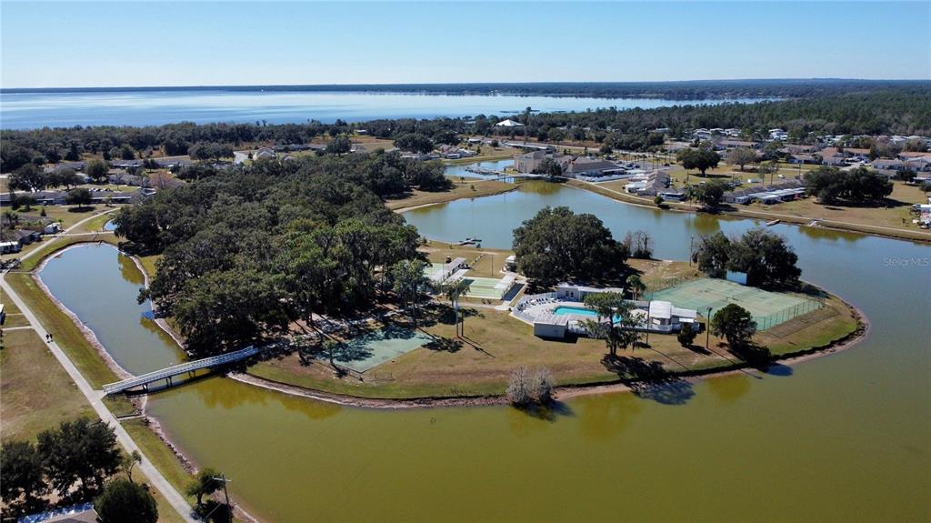3429 Club Circle Lakeshore, FL 33854 - Photo 23 of 37 an aerial view of a house with a garden and lake view