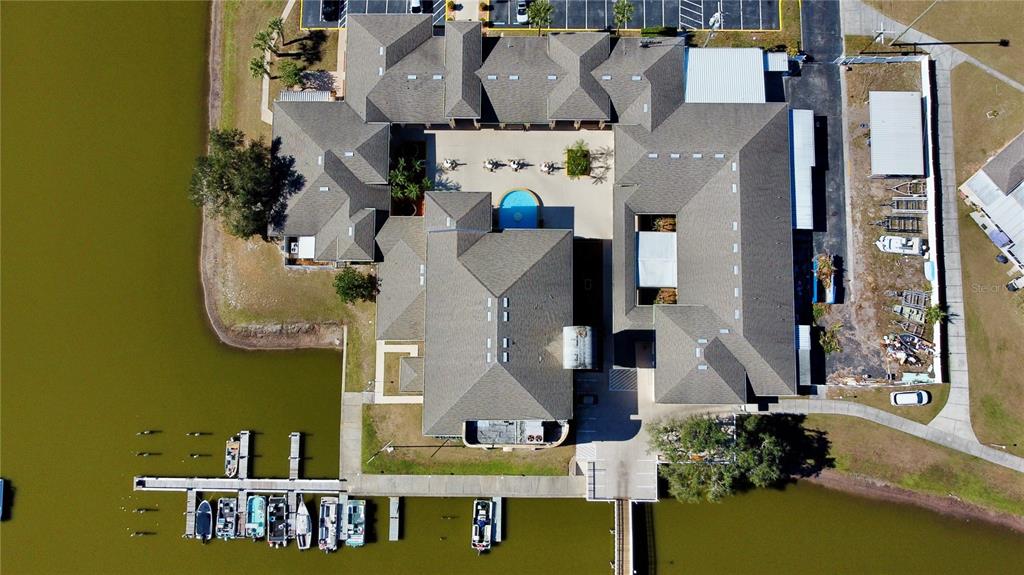 3429 Club Circle Lakeshore, FL 33854 - Photo 25 of 37 an aerial view of residential houses with outdoor space and parking