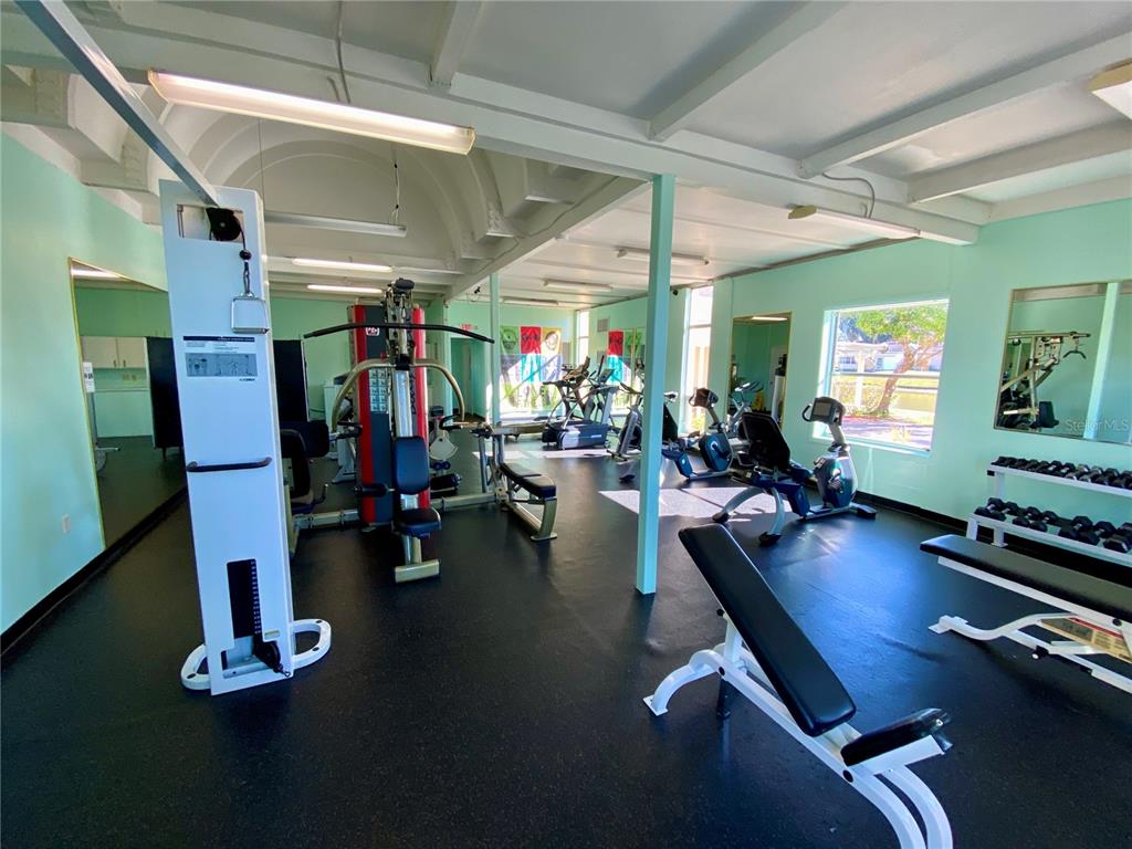 3429 Club Circle Lakeshore, FL 33854 - Photo 31 of 37 a room with gym equipment and a large window