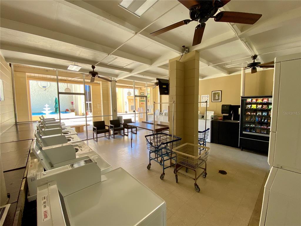 3429 Club Circle Lakeshore, FL 33854 - Photo 34 of 37 a room with lots of table and chairs