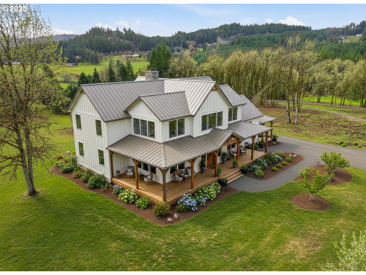 0 Northwest Berry Creek Road, Unit PAR 2 McMinnville, OR 97128 - Photo 3 of 15 a view of a house with a big yard and large trees
