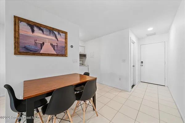 a view of a dining room with furniture