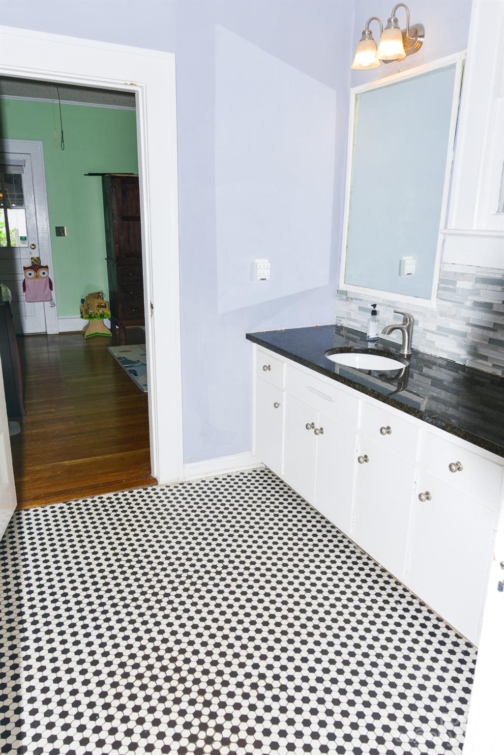 423 North Matson Street Kershaw, SC 29067 - Photo 17 of 33 a bathroom with a sink a mirror and a shower