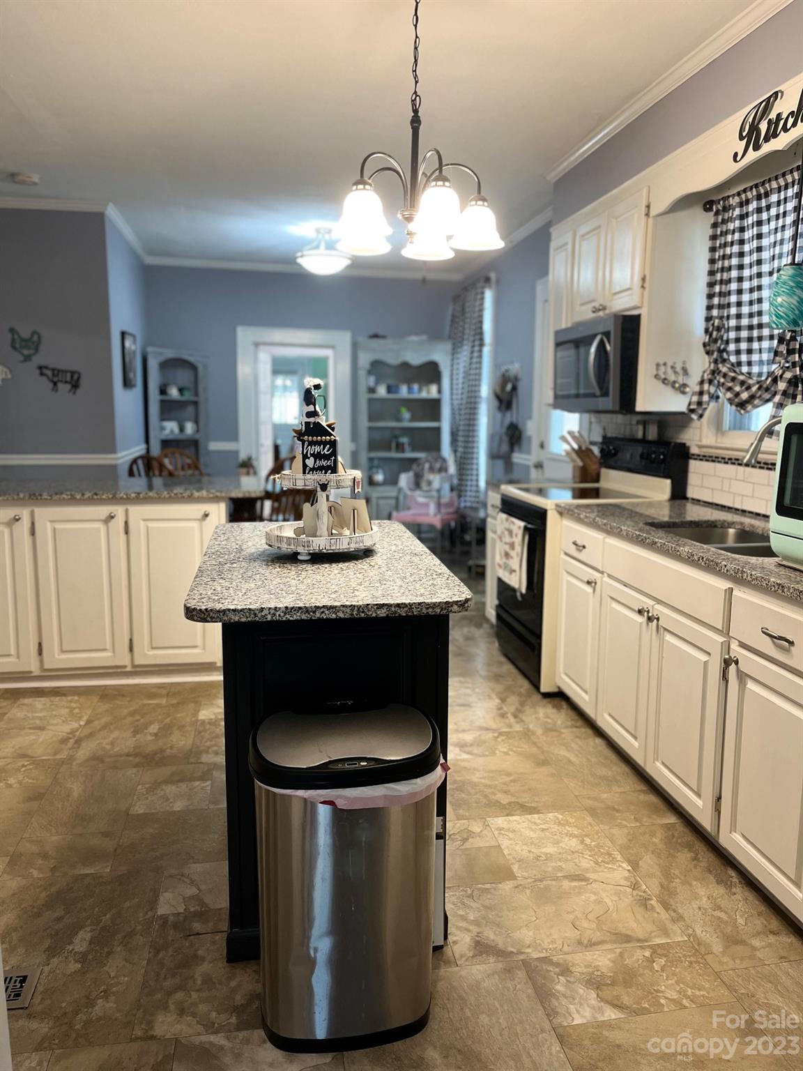 423 North Matson Street Kershaw, SC 29067 - Photo 32 of 33 a kitchen with a stove sink and cabinets