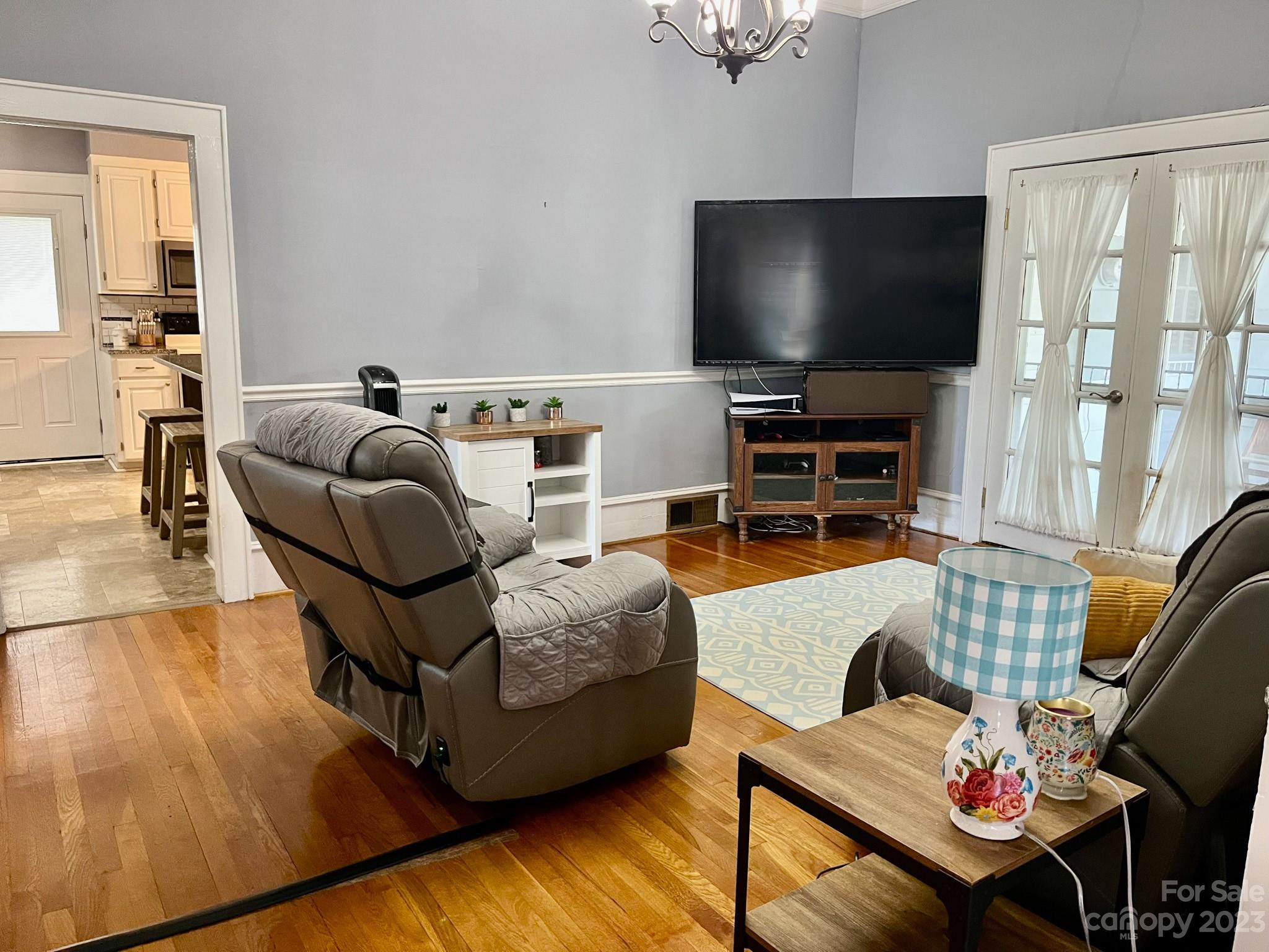 423 North Matson Street Kershaw, SC 29067 - Photo 33 of 33 a living room with furniture and a flat screen tv