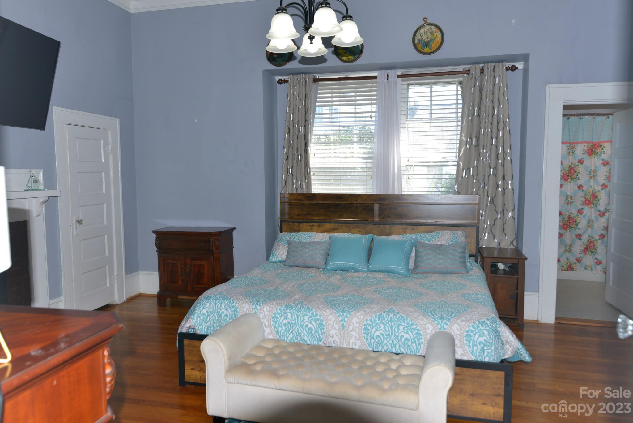 423 North Matson Street Kershaw, SC 29067 - Photo 8 of 33 a bedroom with a bed and window