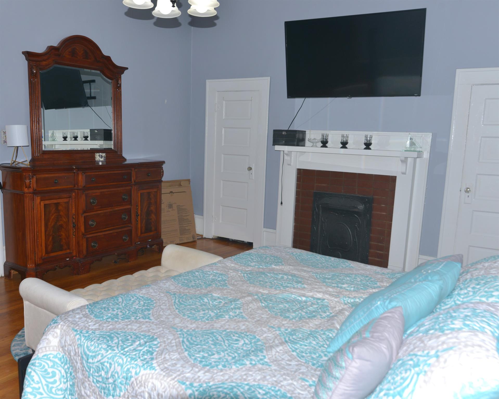 423 North Matson Street Kershaw, SC 29067 - Photo 10 of 33 a bedroom with a bed and flat screen tv