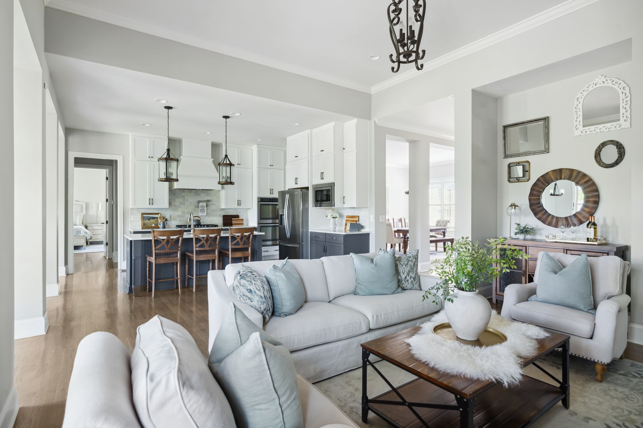 4136 Banner Square Lane Arrington, TN 37014 - Photo 15 of 71 a living room with furniture kitchen view and a chandelier