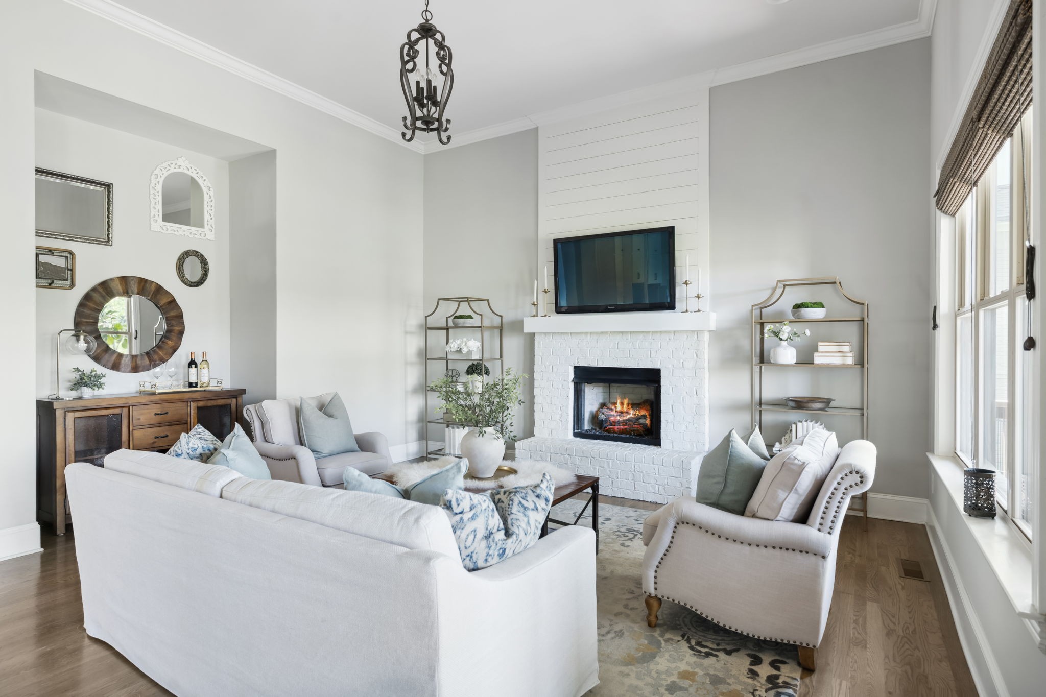 4136 Banner Square Lane Arrington, TN 37014 - Photo 16 of 71 a living room with furniture a fireplace and a flat screen tv