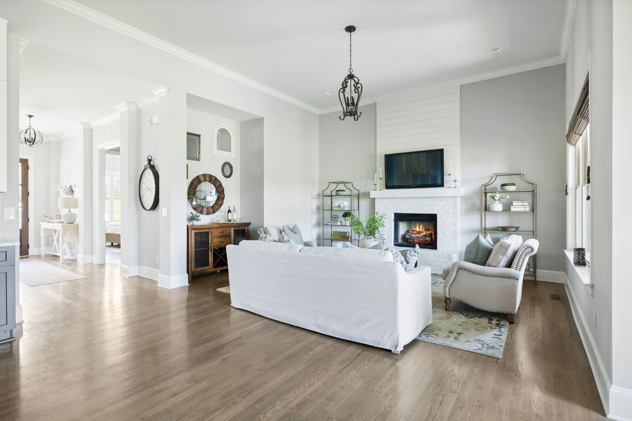 4136 Banner Square Lane Arrington, TN 37014 - Photo 17 of 71 a living room with furniture a fireplace and a flat screen tv
