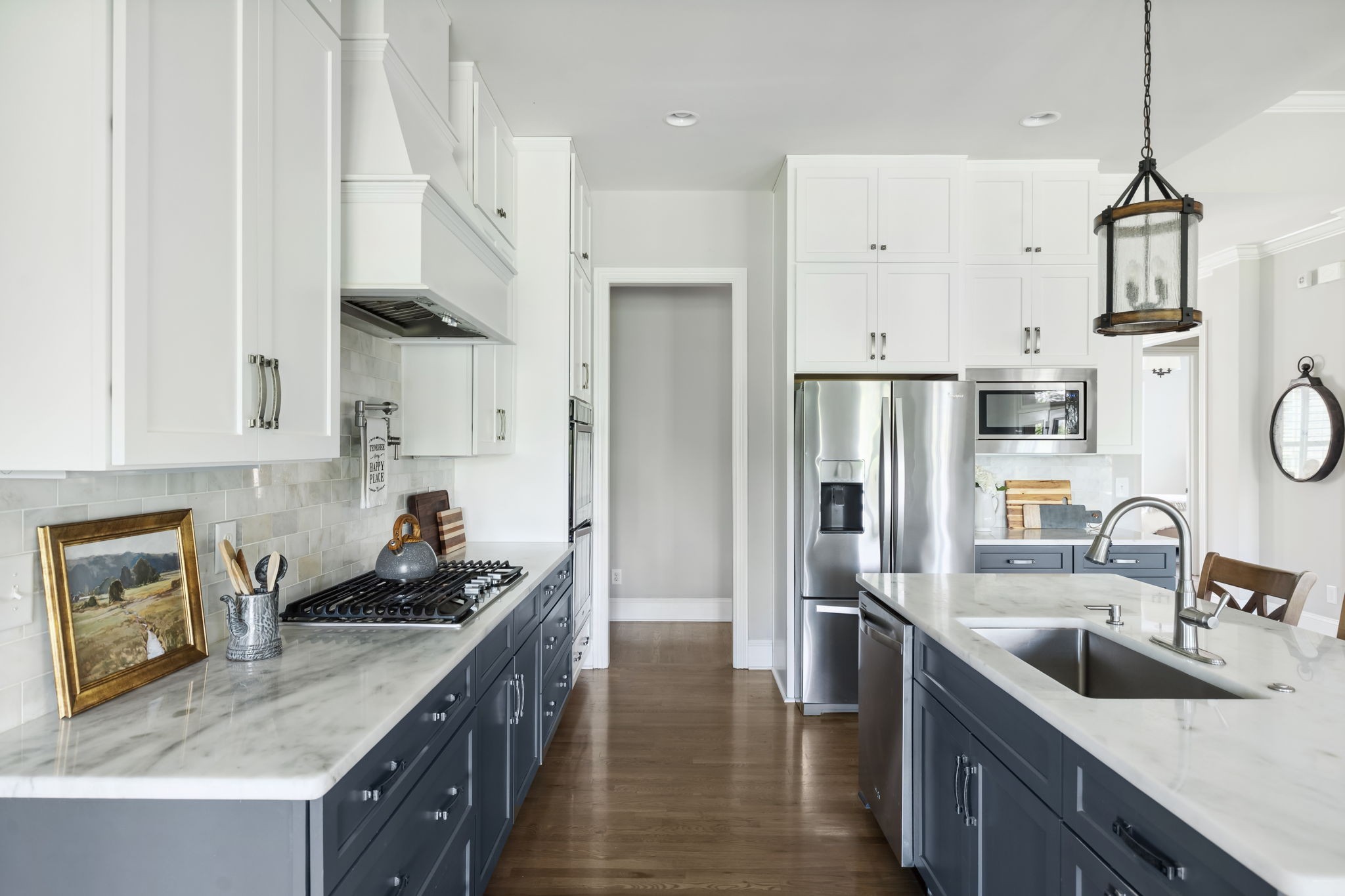 4136 Banner Square Lane Arrington, TN 37014 - Photo 21 of 71 a kitchen with stainless steel appliances granite countertop a sink stove and refrigerator
