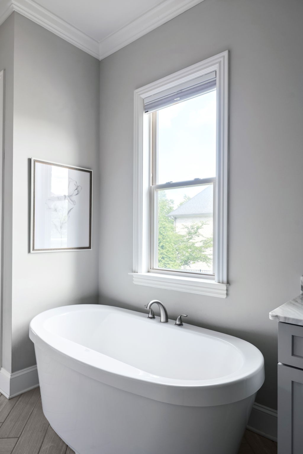 4136 Banner Square Lane Arrington, TN 37014 - Photo 36 of 71 a white bath tub sitting in a bathroom next to a window