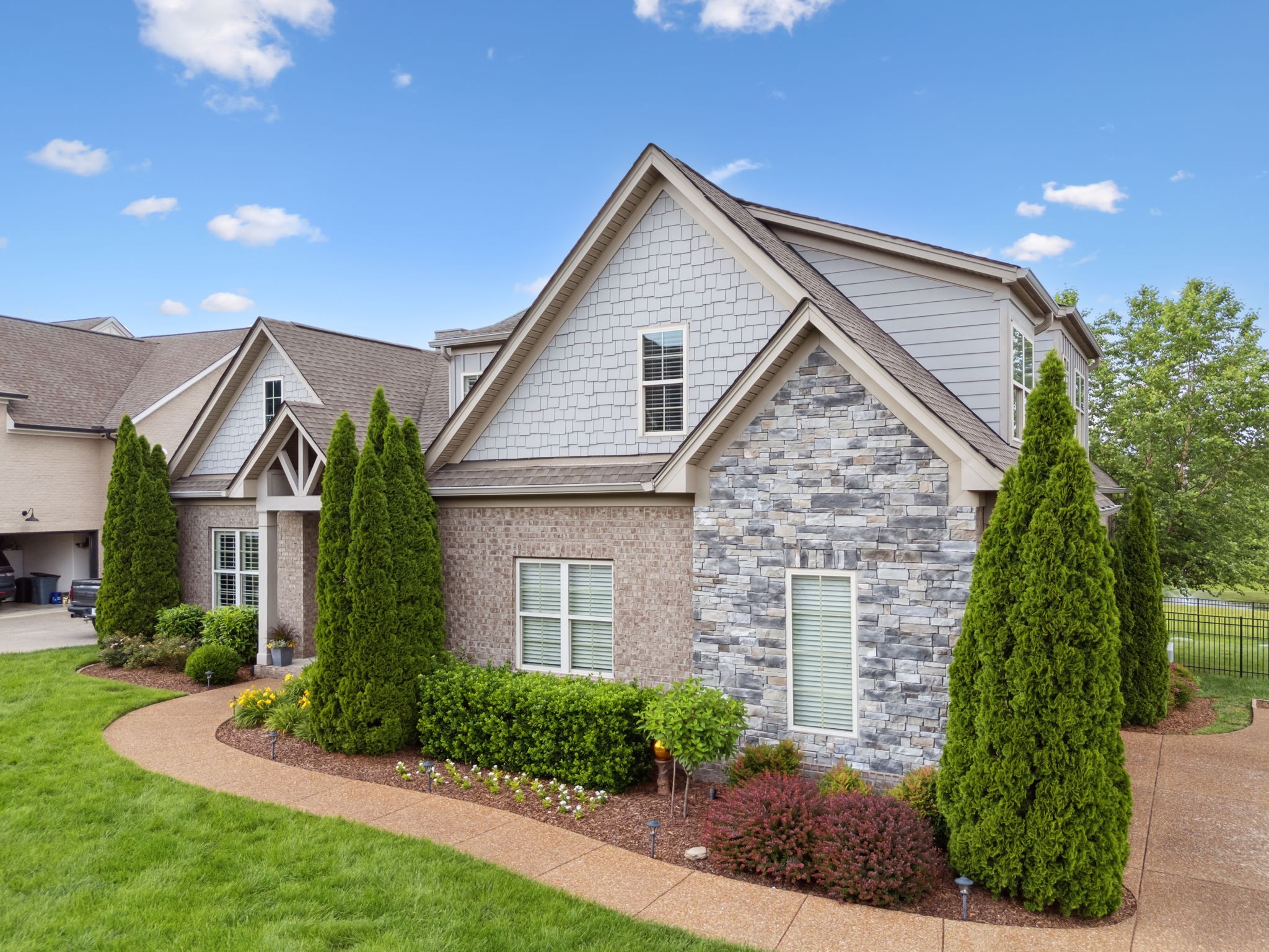 4136 Banner Square Lane Arrington, TN 37014 - Photo 4 of 71 a front view of a house with a yard
