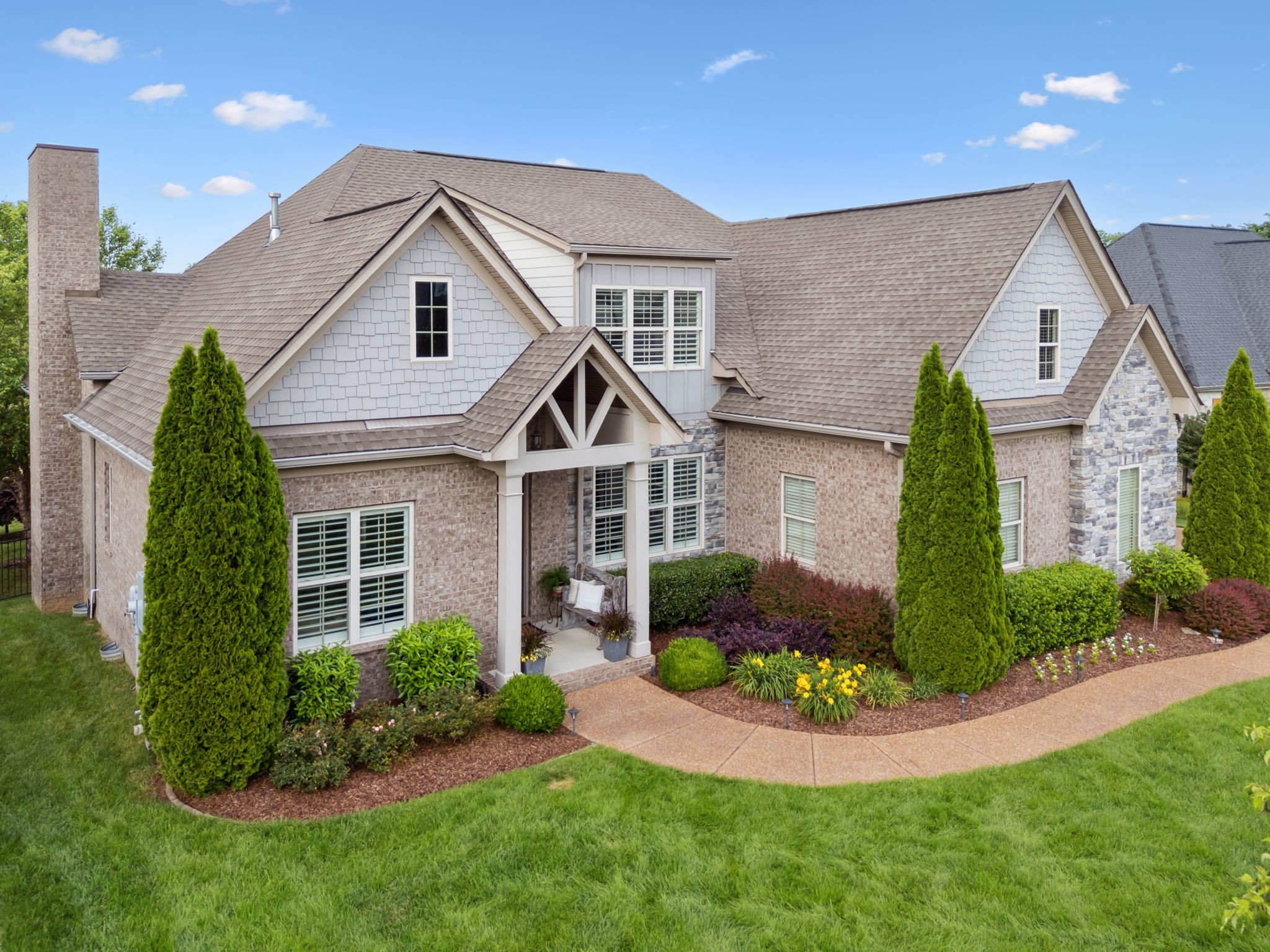 4136 Banner Square Lane Arrington, TN 37014 - Photo 5 of 71 a front view of a house with a garden