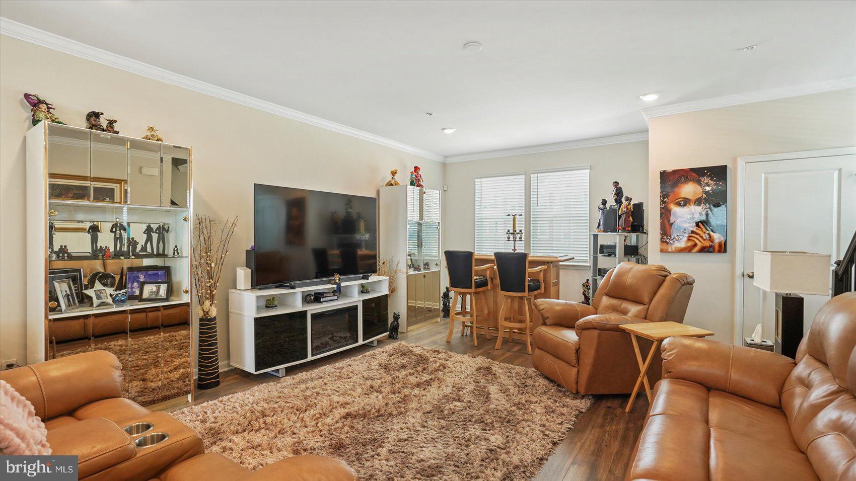 5085 Silver Oak Drive Rosedale, MD 21237 - Photo 18 of 48 a living room with furniture and a flat screen tv