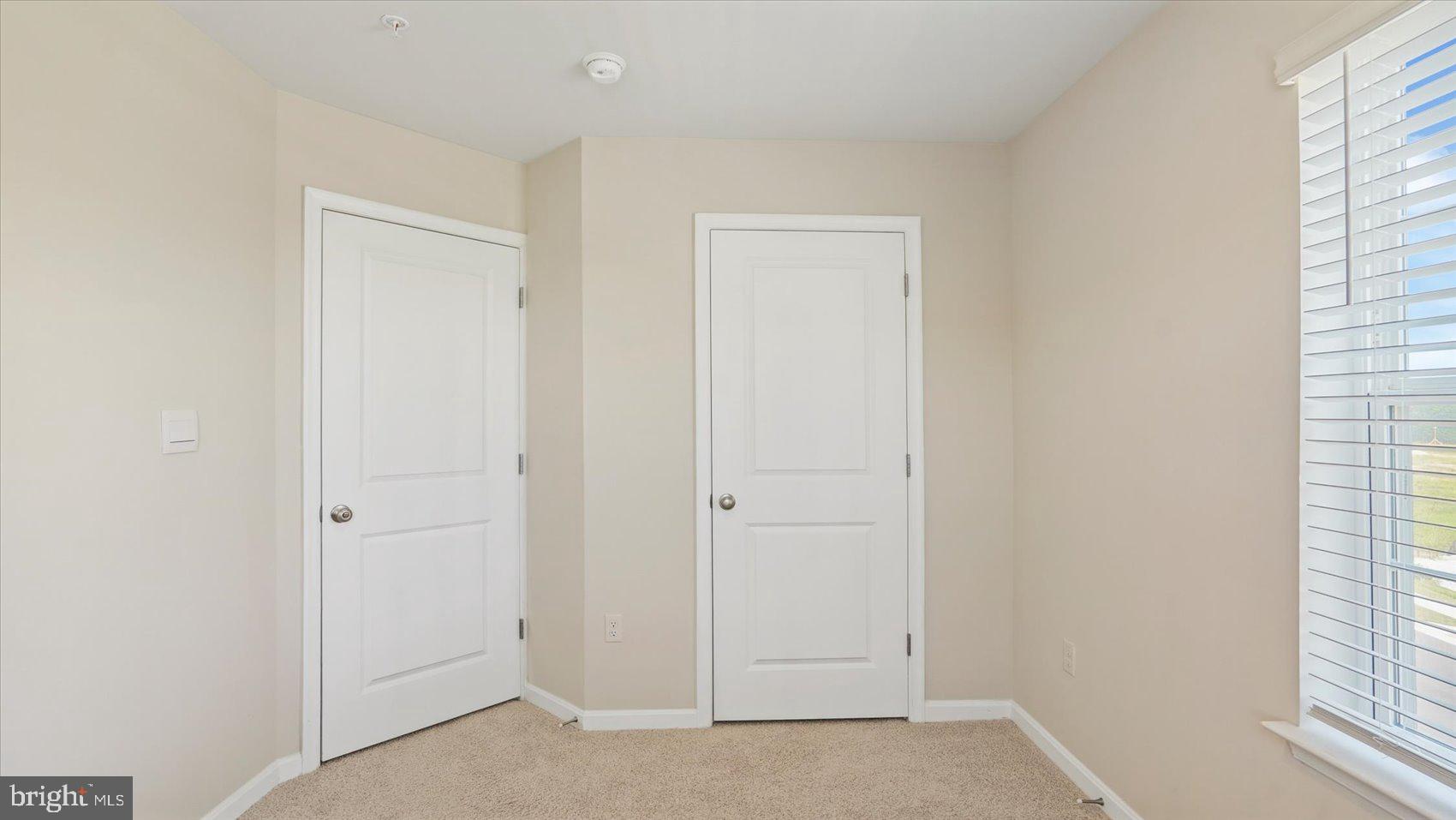 5085 Silver Oak Drive Rosedale, MD 21237 - Photo 25 of 48 an empty room with windows