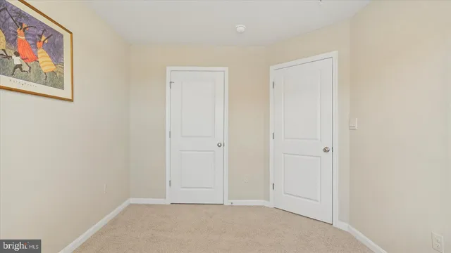 a view of hallway with painting on the wall