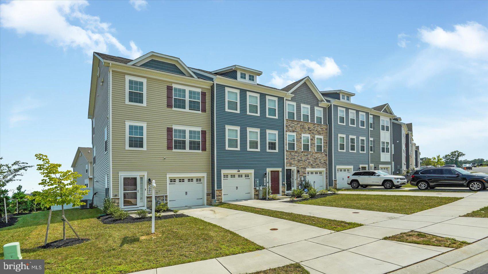 5085 Silver Oak Drive Rosedale, MD 21237 - Photo 3 of 48 a front view of a building with garden