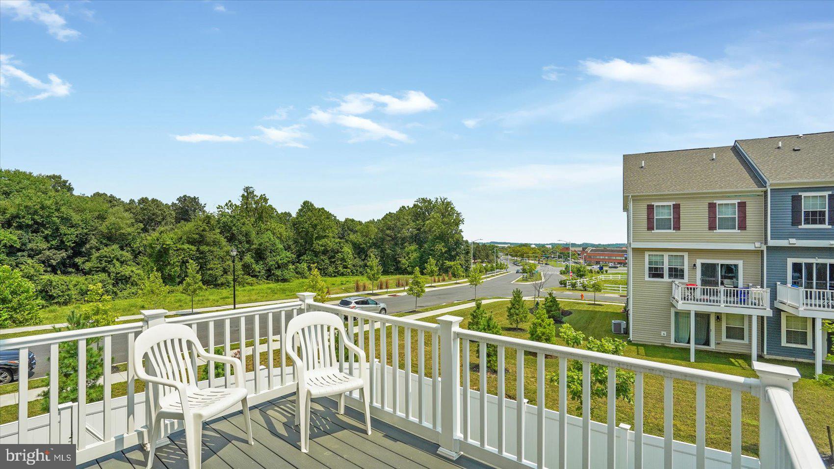 5085 Silver Oak Drive Rosedale, MD 21237 - Photo 36 of 48 a view of a balcony with chairs
