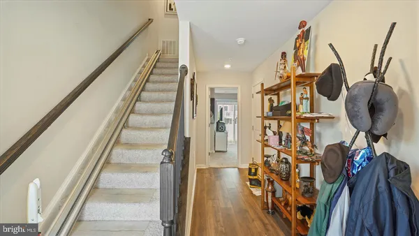 a view of entryway with wooden floor