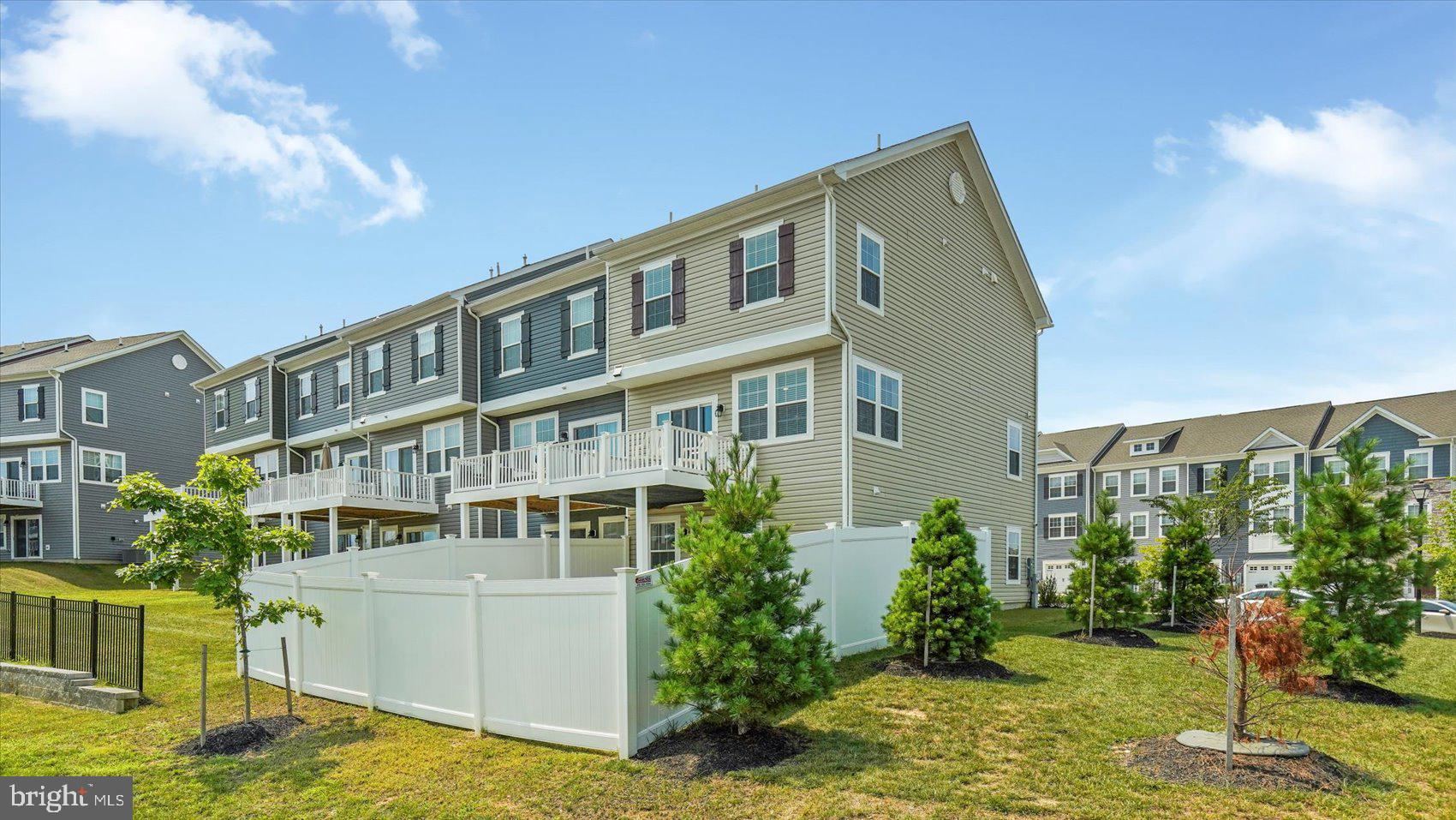 5085 Silver Oak Drive Rosedale, MD 21237 - Photo 44 of 48 a front view of a house with a yard