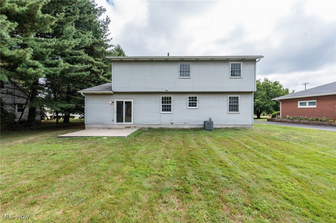 3324 Marsh Road Stow, OH 44224 - Photo 33 of 33 Rear view of house with a patio and a yard