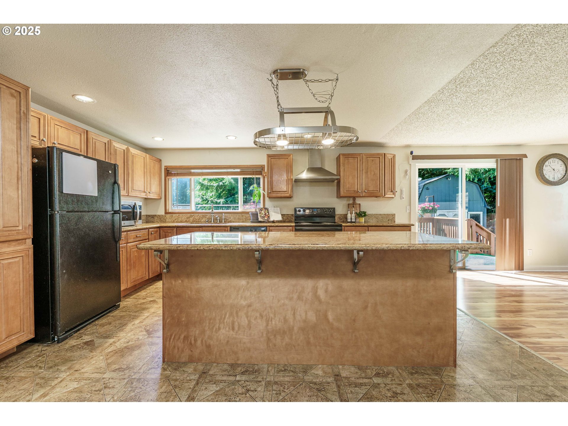 71682 Neer City Road Rainier, OR 97048 - Photo 10 of 48 a large kitchen with stainless steel appliances a large counter top
