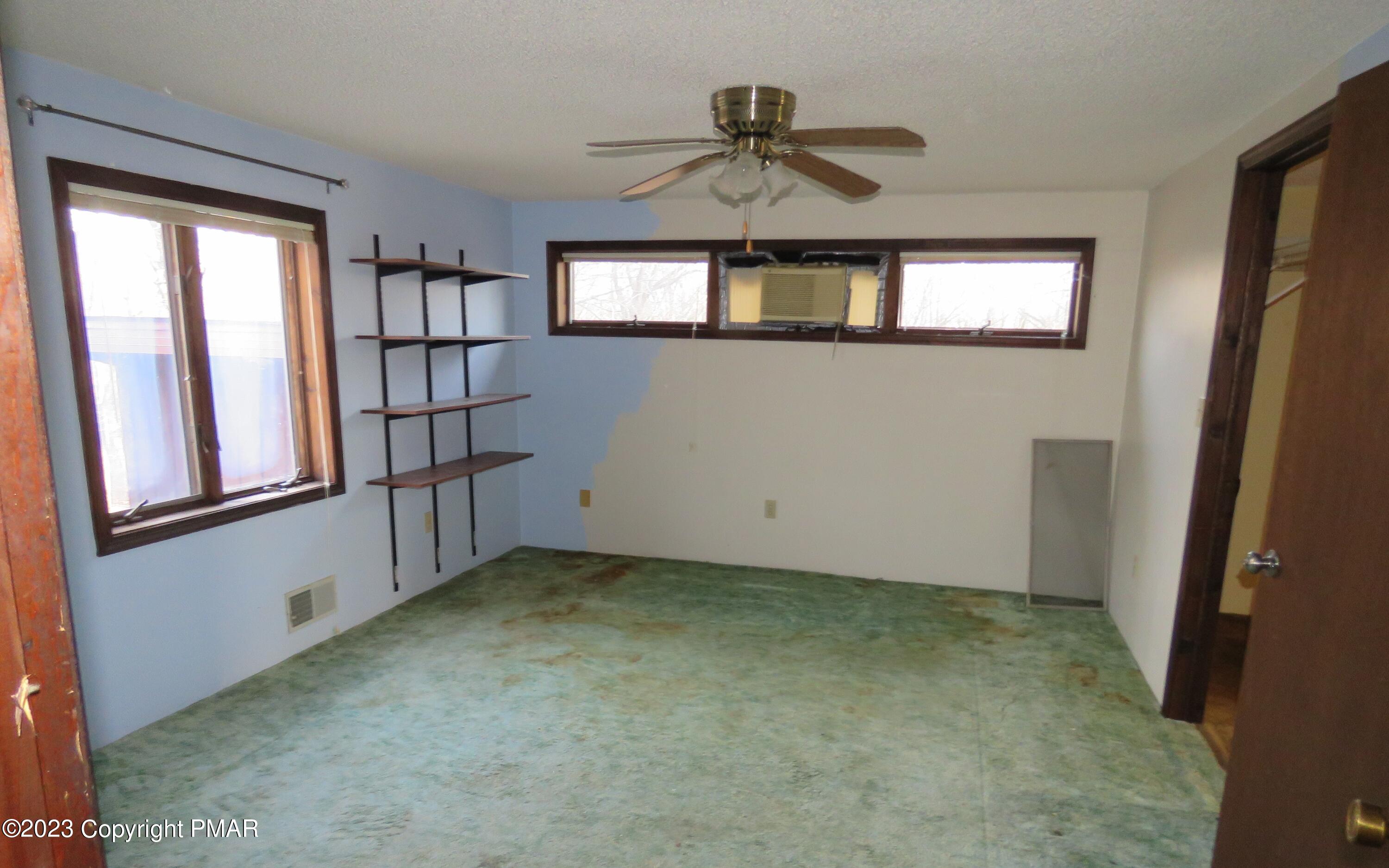 2653 Mountain Road Slatington, PA 18080 - Photo 11 of 19 wooden floor in an empty room with a window
