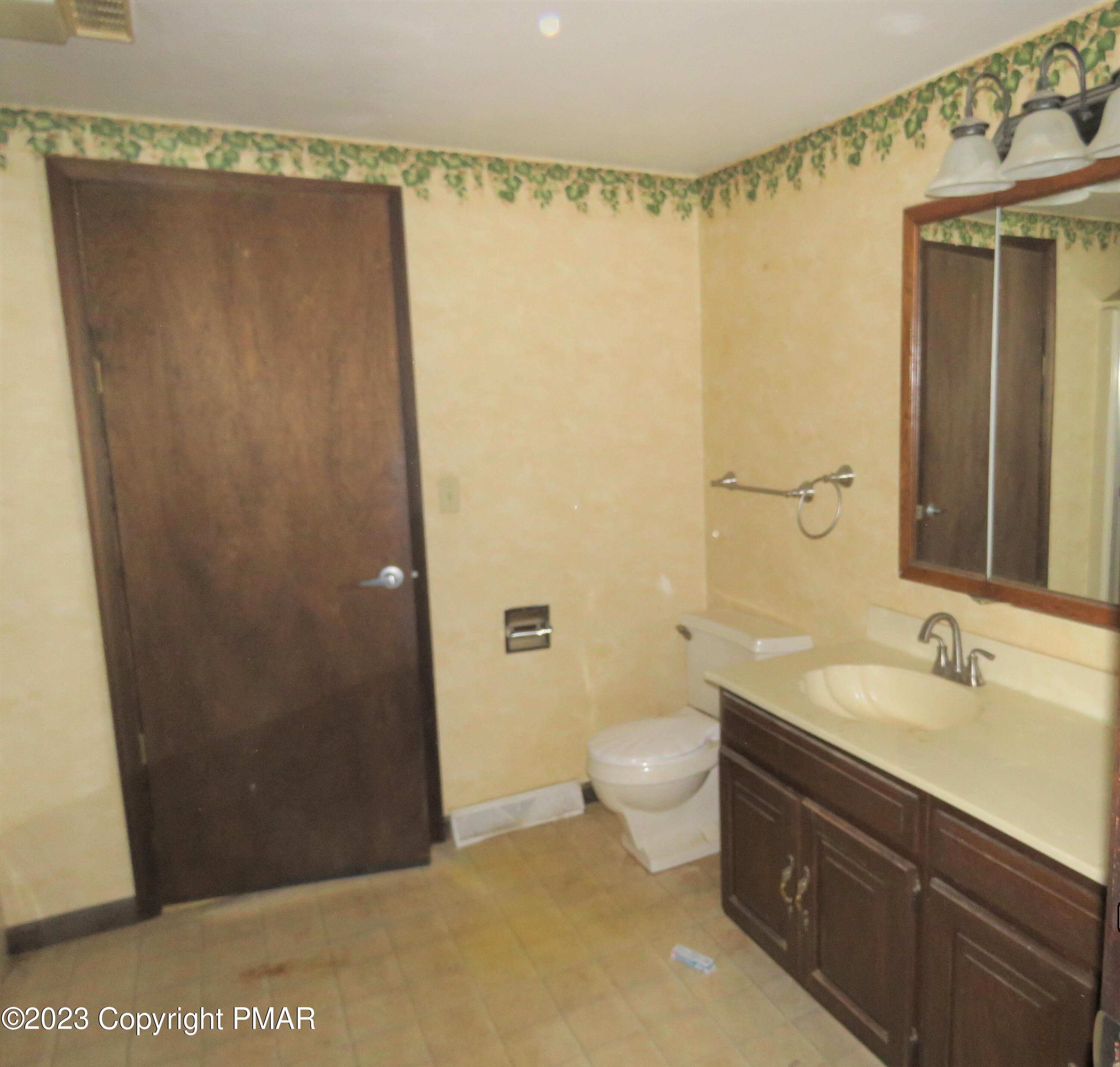 2653 Mountain Road Slatington, PA 18080 - Photo 13 of 19 a bathroom with a sink a toilet and shower