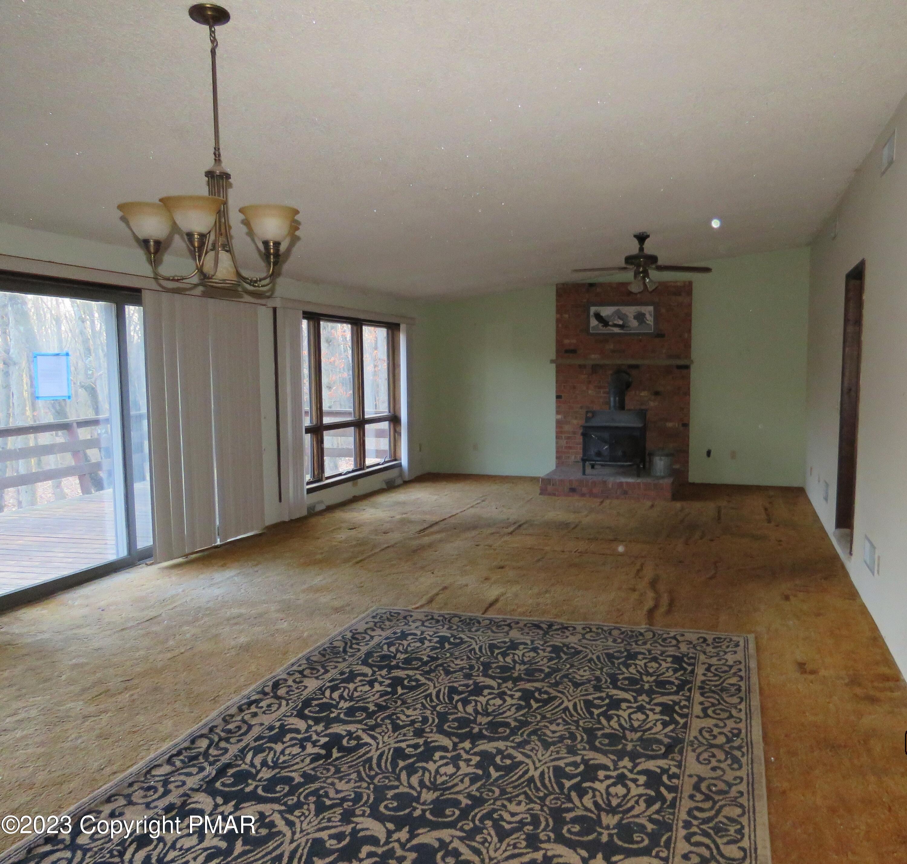 2653 Mountain Road Slatington, PA 18080 - Photo 18 of 19 a view of empty room with a fireplace