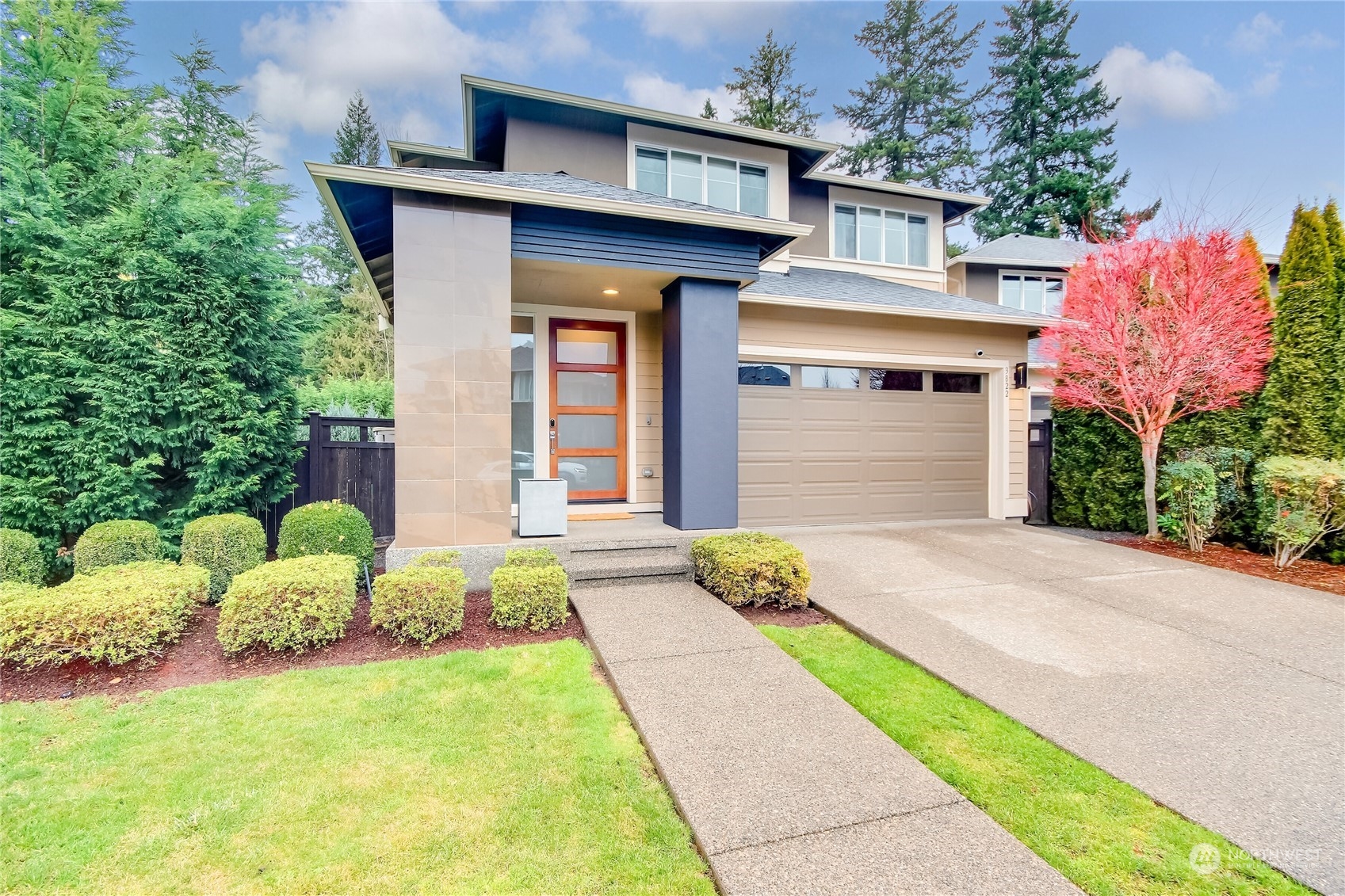 3822 Northeast 24th Court Renton, WA 98056 - Photo 1 of 37 a front view of a house with a yard