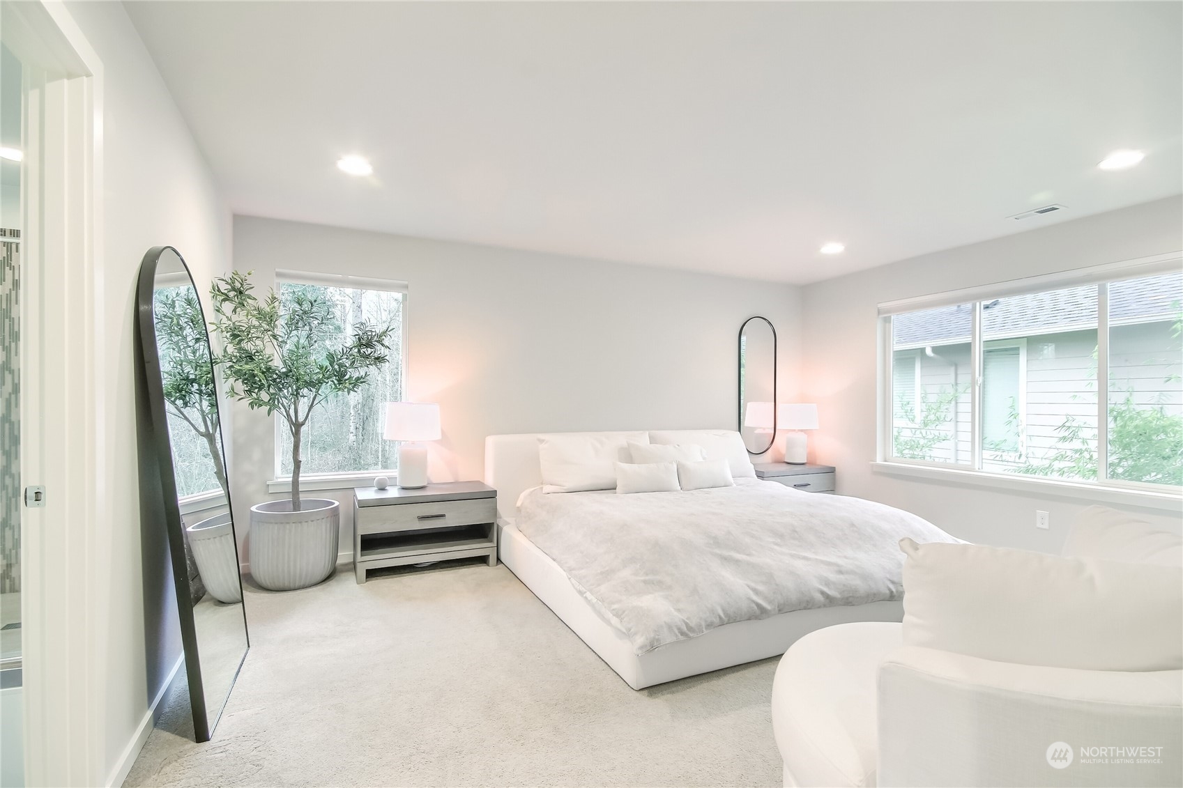 3822 Northeast 24th Court Renton, WA 98056 - Photo 14 of 37 a bedroom with a bed and a couch
