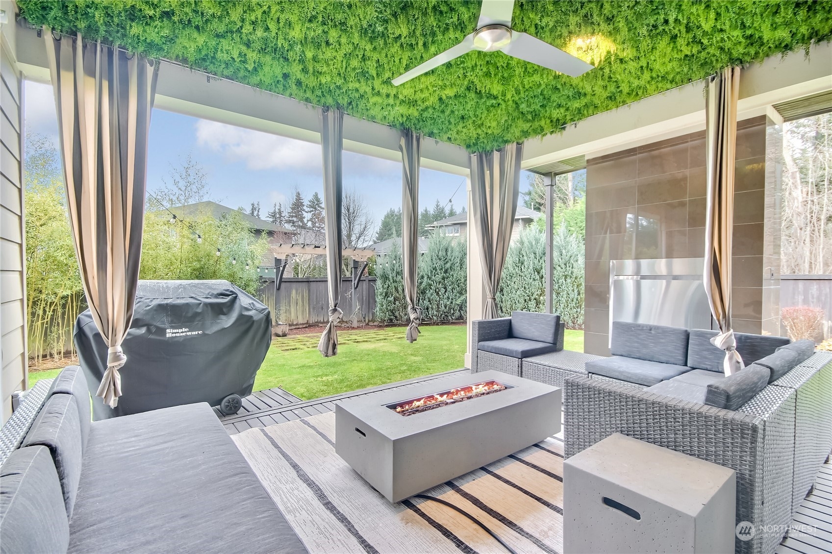 3822 Northeast 24th Court Renton, WA 98056 - Photo 31 of 37 a patio with patio couch and table