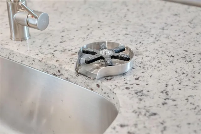 a spacious bathroom with a granite countertop sink and a large mirror