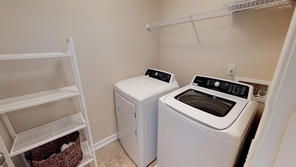 5299 Magnolia Grove Way, Unit 182 Gainesville, GA 30504 - Photo 50 of 79 a utility room with dryer and washer