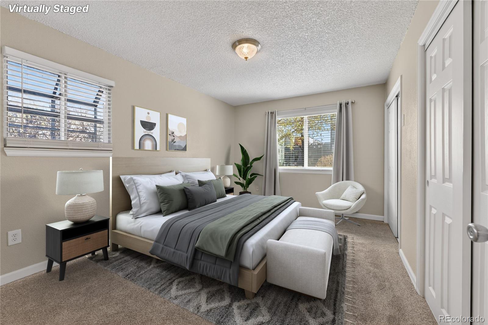 4400 South Quebec Street, Unit 101P Denver, CO 80237 - Photo 10 of 26 a bedroom with a bed and window