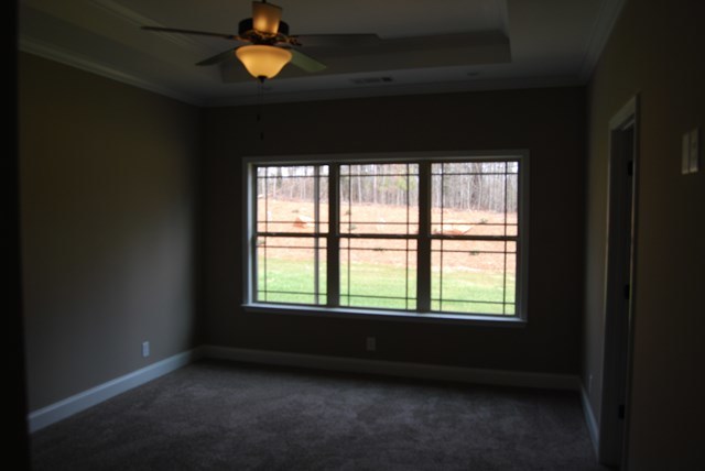 185 Presidents Way Forsyth, GA 31029 - Photo 8 of 18 a view of an empty room with a window