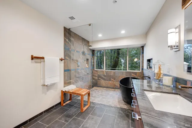 a lobby with furniture and a large window