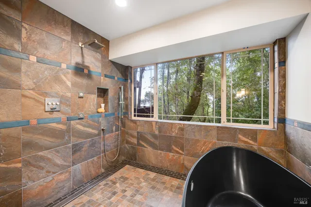 a view of a bathroom with a large window