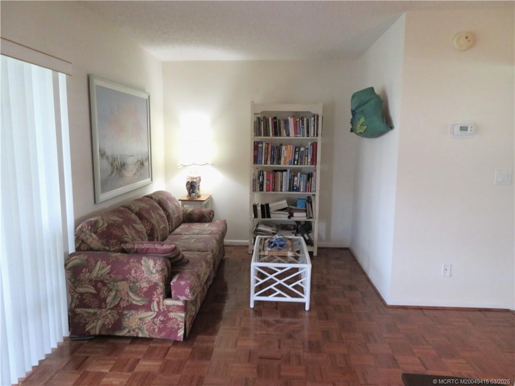 1843 Southeast Granada Lane Stuart, FL 34996 - Photo 12 of 31 a living room with furniture and a window