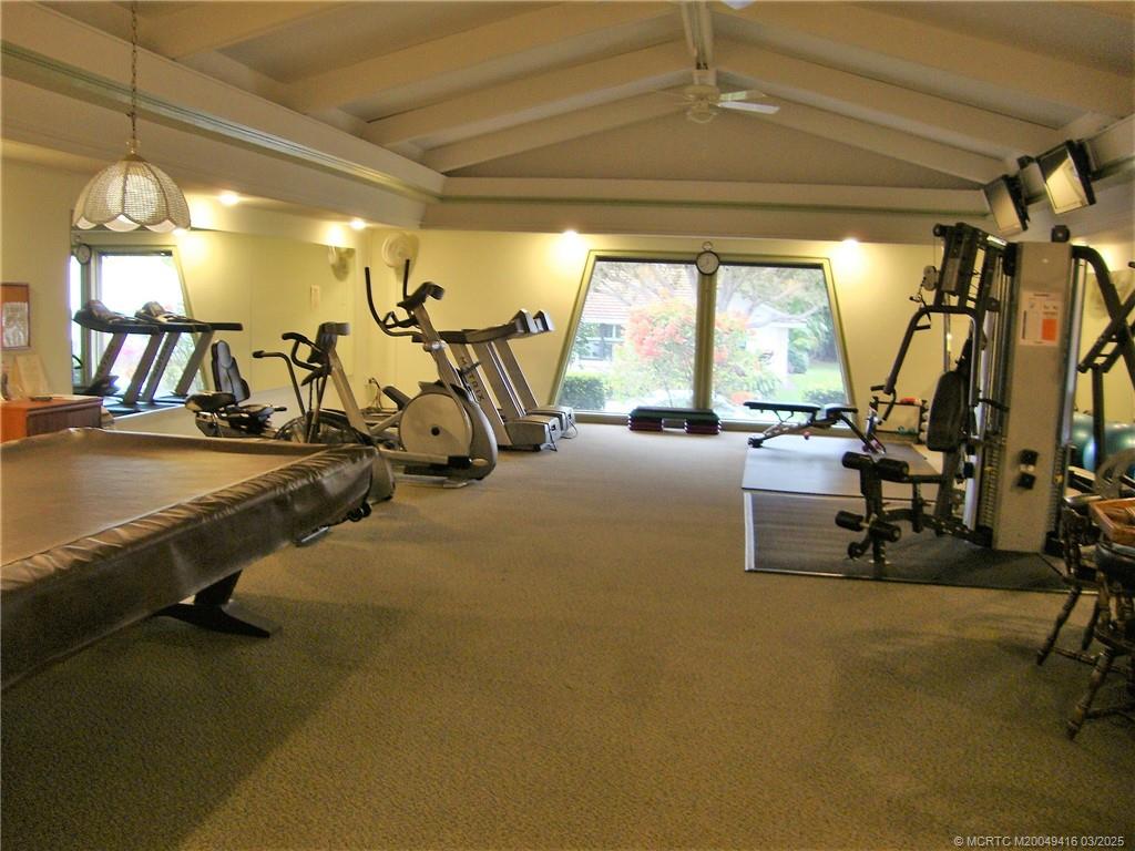 1843 Southeast Granada Lane Stuart, FL 34996 - Photo 26 of 31 a view of a room with gym equipment