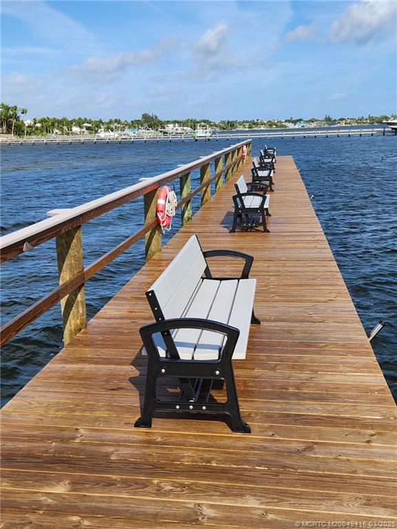 1843 Southeast Granada Lane Stuart, FL 34996 - Photo 28 of 31 a roof deck with outdoor seating