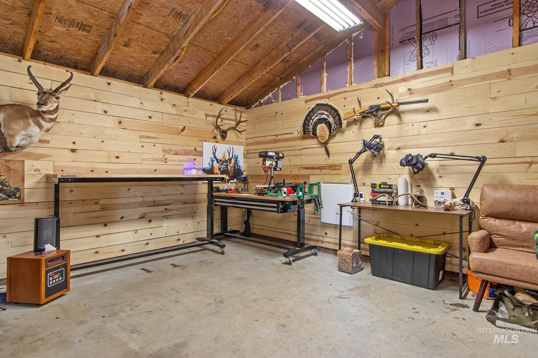 12 Meadow Creek Road Idaho City, ID 83631 - Photo 39 of 44 Interior space featuring a workshop area and wood walls