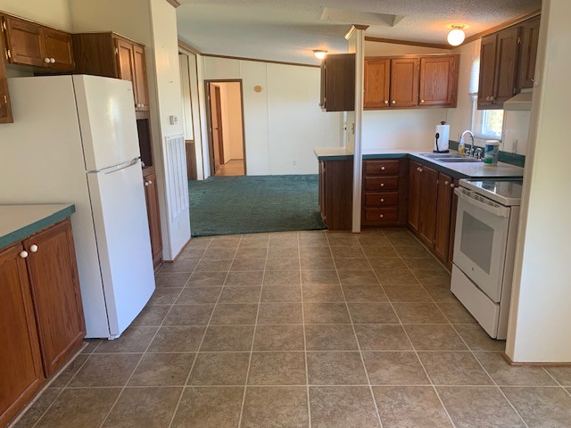890 Bell Road Watertown, TN 37184 - Photo 13 of 62 a kitchen with stainless steel appliances a refrigerator and a sink