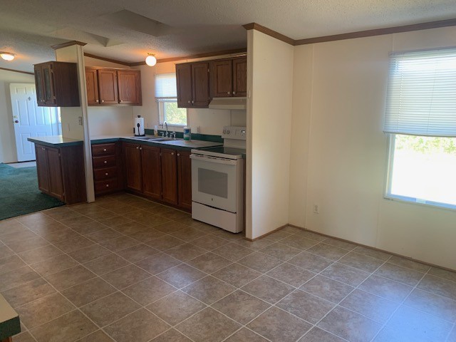 890 Bell Road Watertown, TN 37184 - Photo 14 of 62 a kitchen with stainless steel appliances a refrigerator and a stove top oven