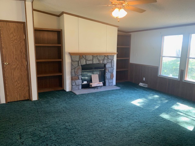 890 Bell Road Watertown, TN 37184 - Photo 21 of 62 a view of an empty room with a fireplace and a window